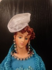 Antique Lady Porcelain face Doll with wood base & jewlery picture