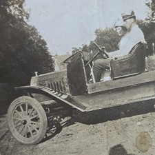 Vintage Photo Snapshot of Young Couple in Nice Clothes Driving Antique Car picture