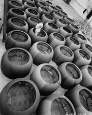 High angle view aviation engineer standing among engine cowlings a- Old Photo picture