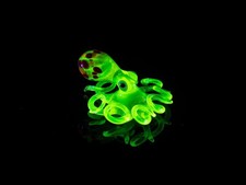Orange Red Uranium glass octopus figurine glowing Murano glass sea creature UV picture