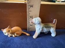 2 vintage ceramic animals. Dog and cat picture