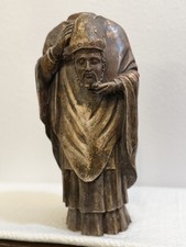 VINTAGE HAND CARVED WOOD SANTOS DEPICTING SAINT FIRMIN HOLDING HIS HEAD picture