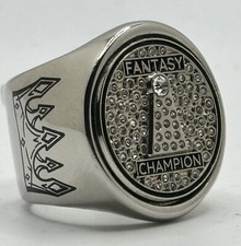 The Fantasy Champion deCAPitator ring bottle cap and can tab opener picture