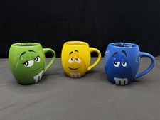 M&M World Yellow Blue & Green Completely Nuts Coffee Mug 2015 Mars Barrel Shape picture