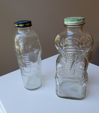 2 Vintage Elephant Glass Bottle Coin banks - Lucky Jumbo & Grapette picture