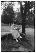 Photo:Galli-Curci Reading on Log with Dog in Park ca. 1920-1925 picture