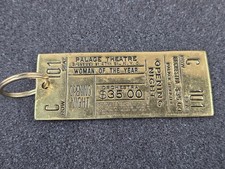 Keychain - Vintage Brass Broadway Ticket Woman of the Year picture