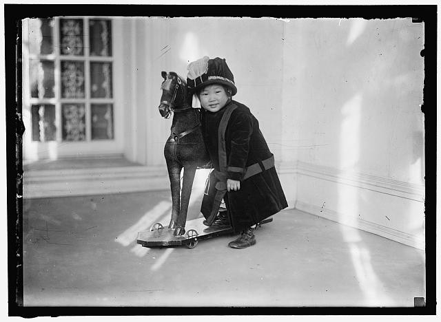 Photo:Millicent Tongo Chang 1912 Child with Toy Horse
