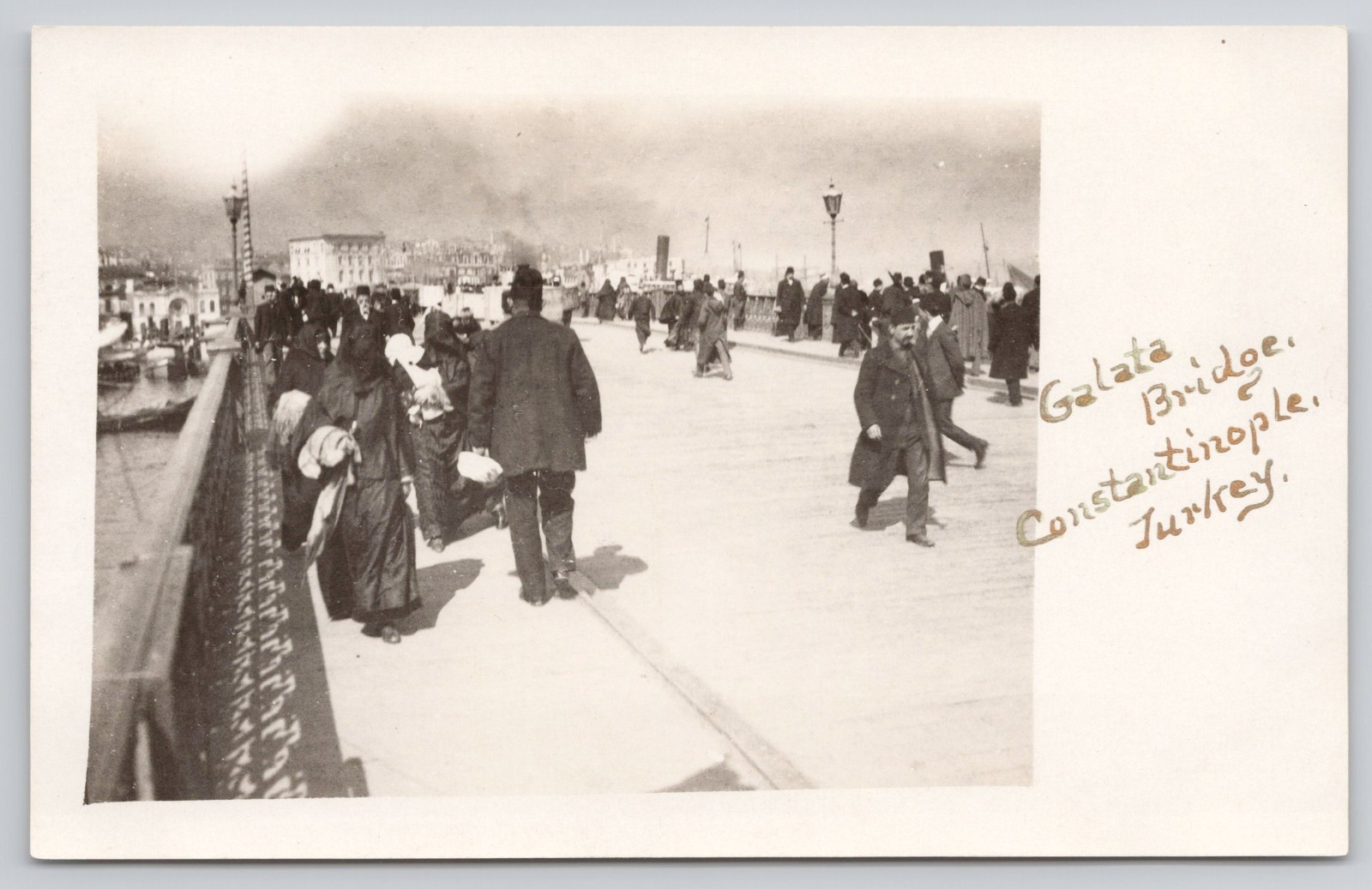 Constantinople Turkey People on Galata Bridge c1910s RPPC Gold Ink Postcard