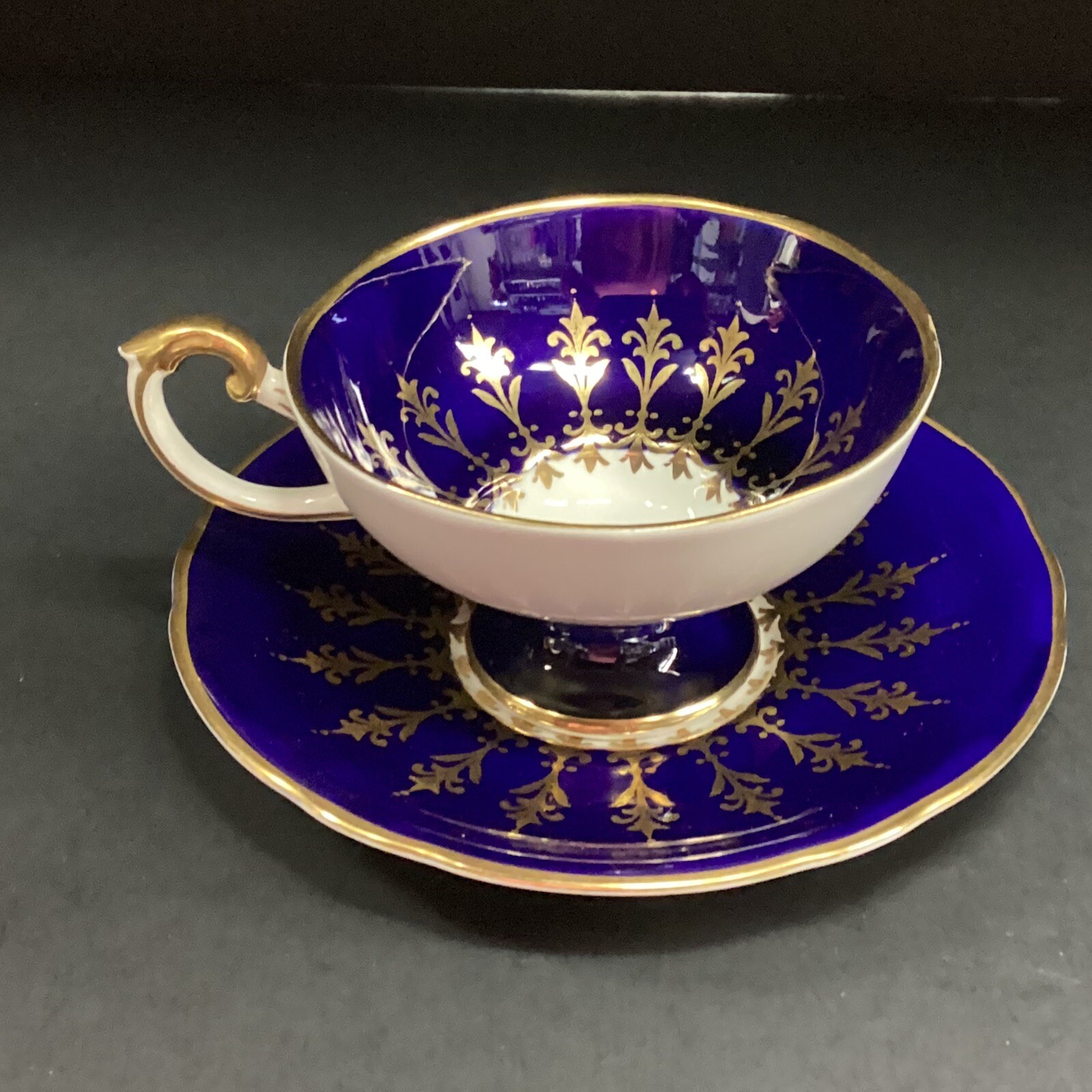 Scarce Cobalt Blue Aynsley Footed teacup and saucer set bone China UK gold gilt