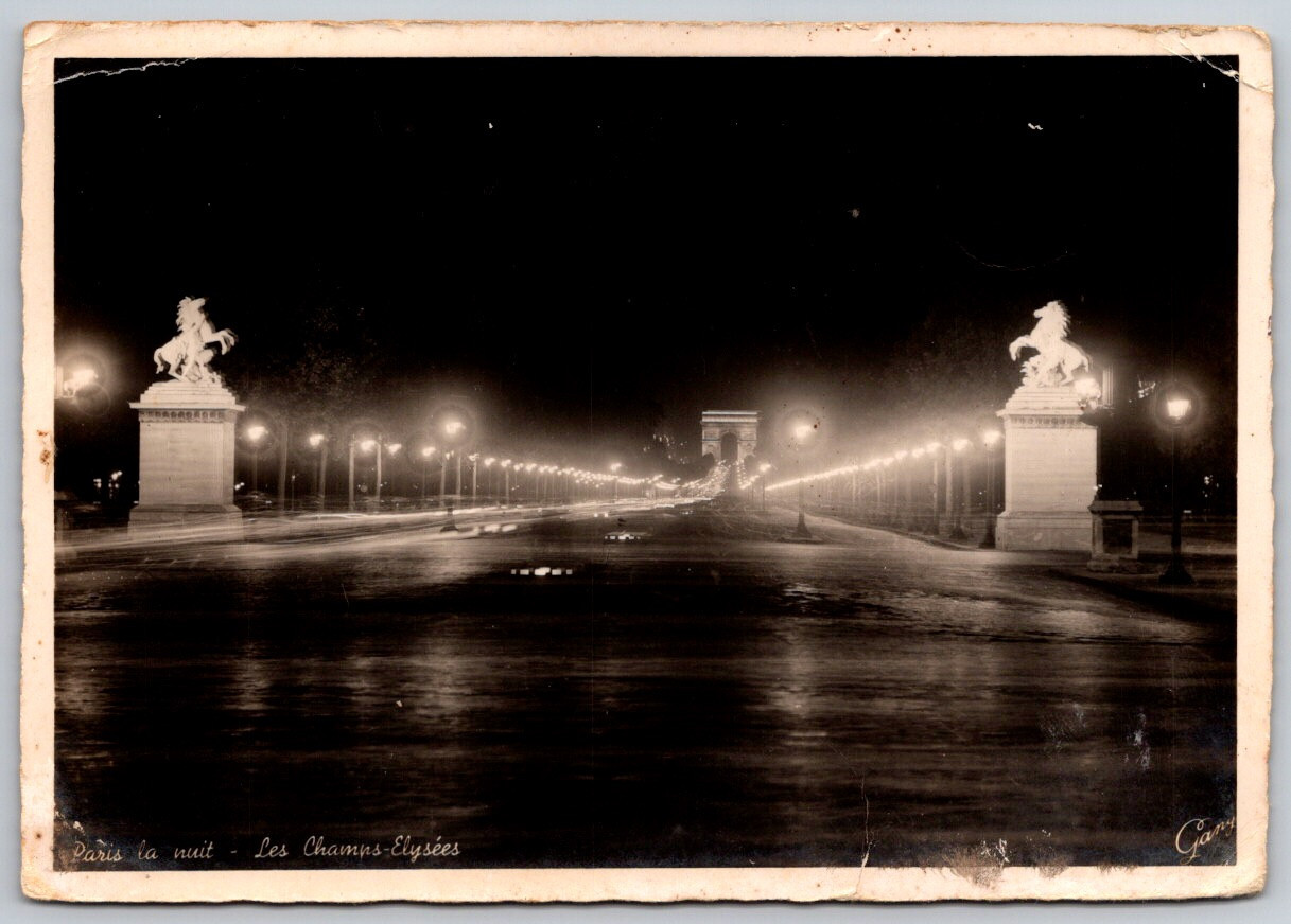 PARIS Les Champs Elysées la Nuit RPPC Real Photo Postcard Stamped