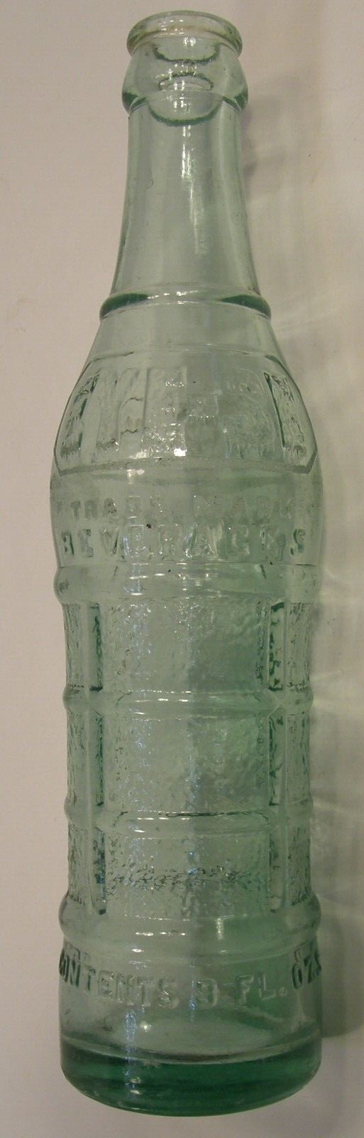 VINTAGE EYE-SE BEVERAGES SODA BOTTLE 9 OZ CLEAR GREEN GLASS