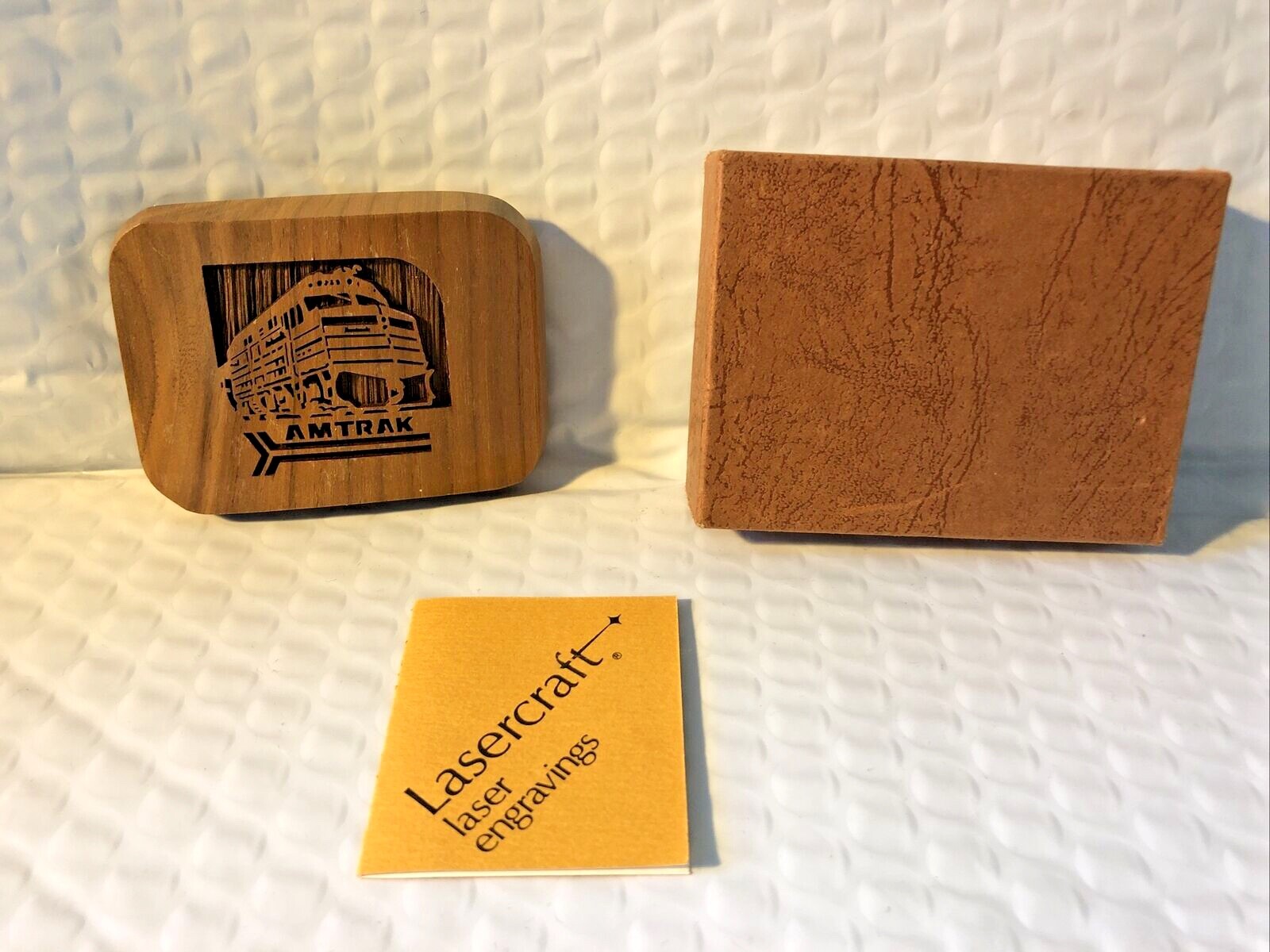 Vintage New in box 1977 Lasercraft AMTRAK Belt Buckle Carved wood relief 