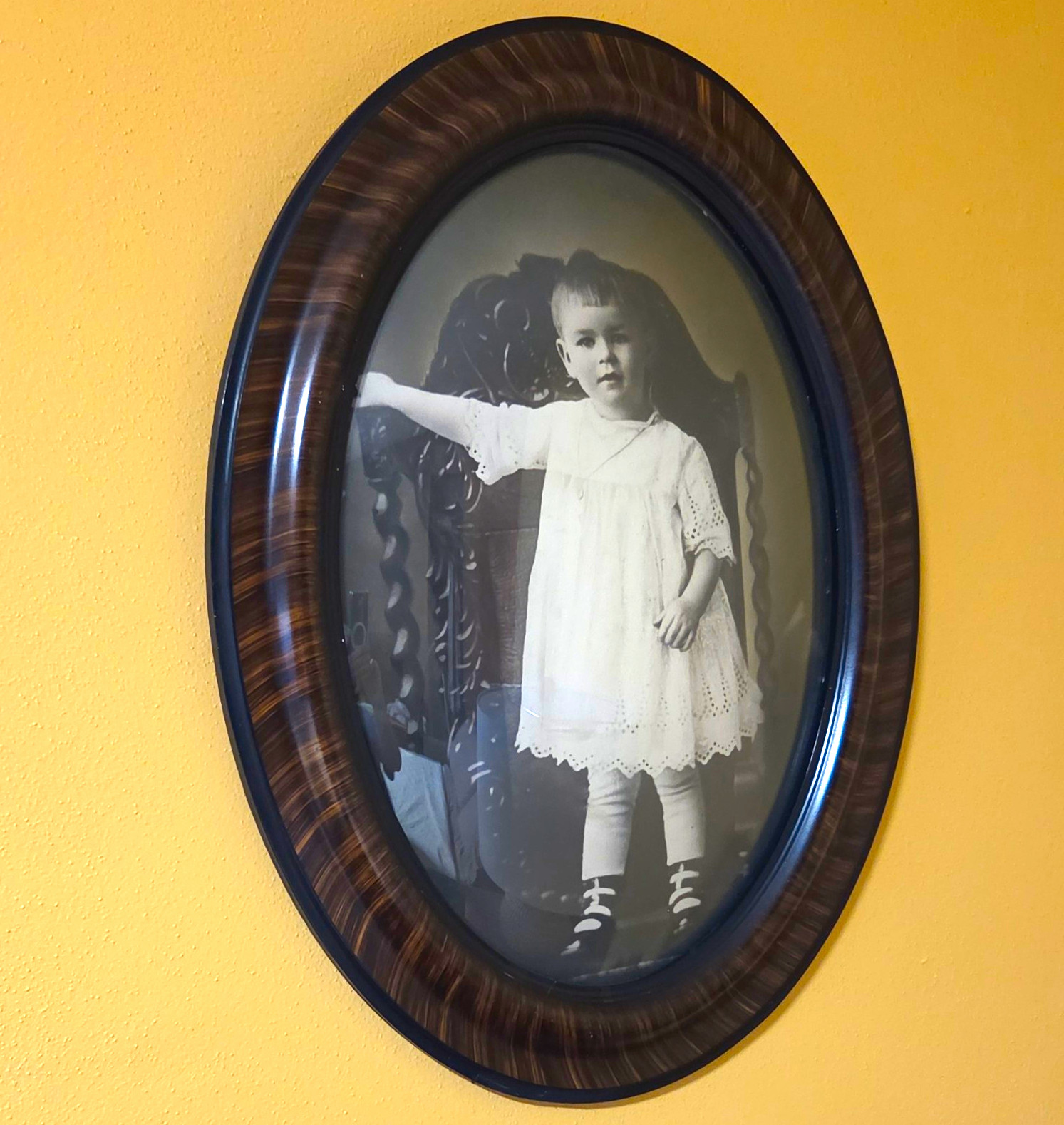  Antique oval portrait of child in tiger-stripe wooden frame convex bubble glass