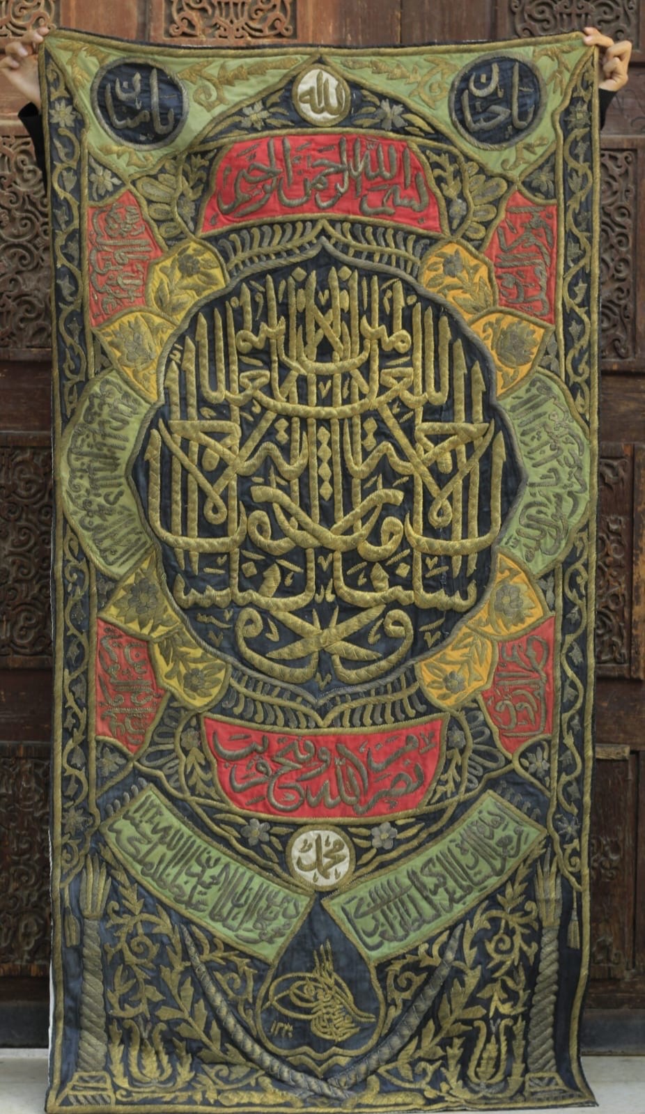 A CURTAIN OF THE INTERNAL TAWBAH DOOR OF THE KA'BA WITH  SULTAN Mahmoud Khan
