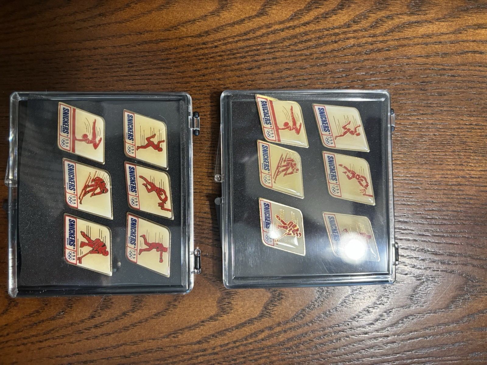 2 Vintage Sets Snickers Advertising 1992 USA Olympics Pins Brand New In Case.