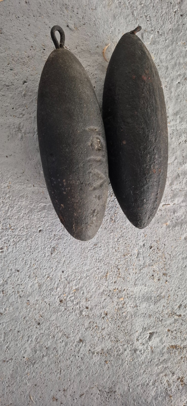 TWO ANTIQUE CLOCK WEIGHTS WEIGHING APPROX 9 POUNDS EACH