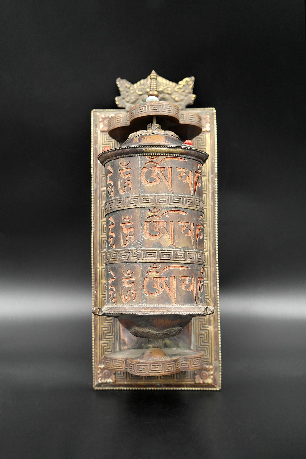 Antique Wall-mounted Om Mani Padme Hum prayer wheel that brings peace