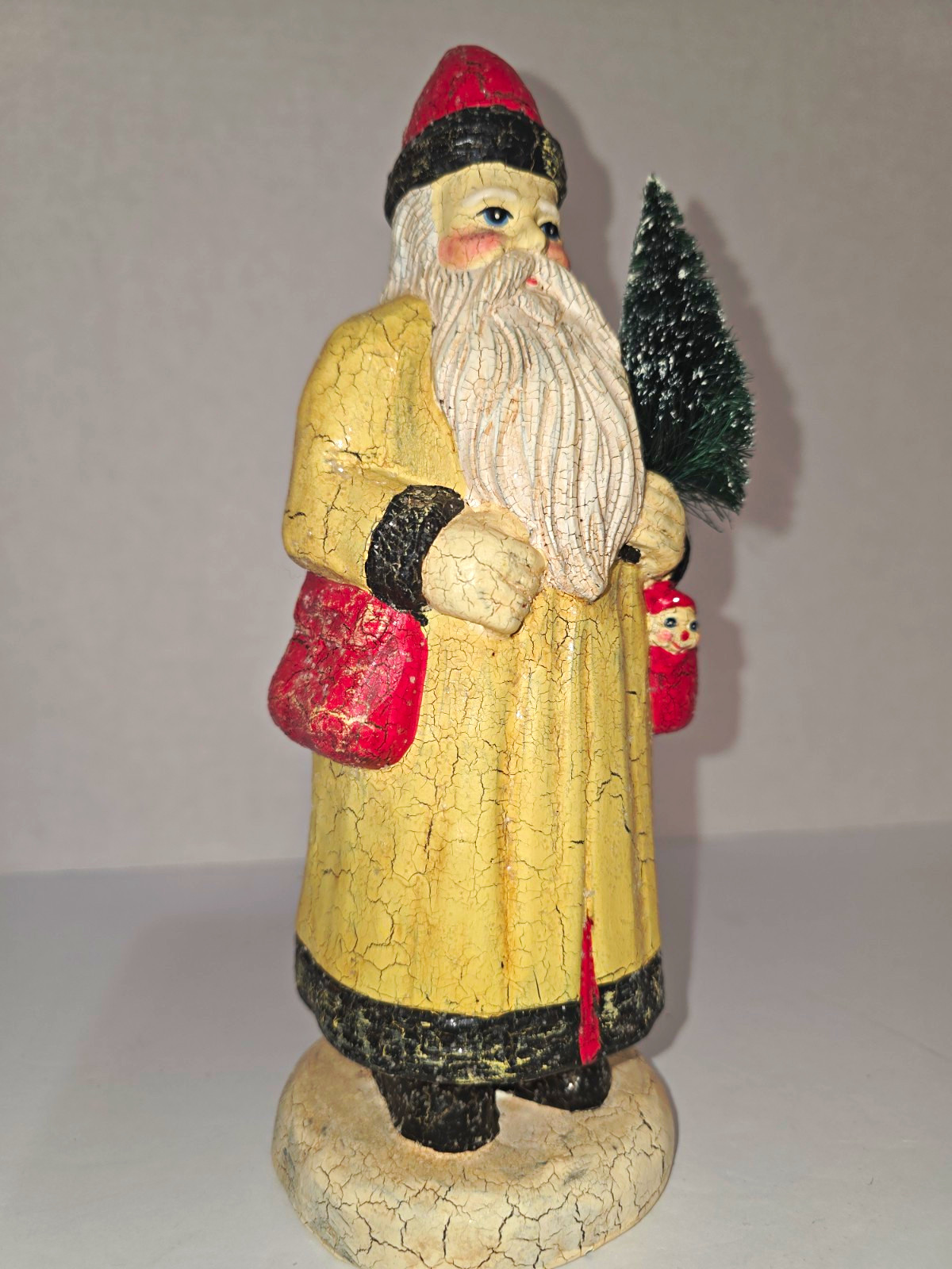 Primitive  Folk-Art Santa Crackle Finish resin with bottle -brush tree 