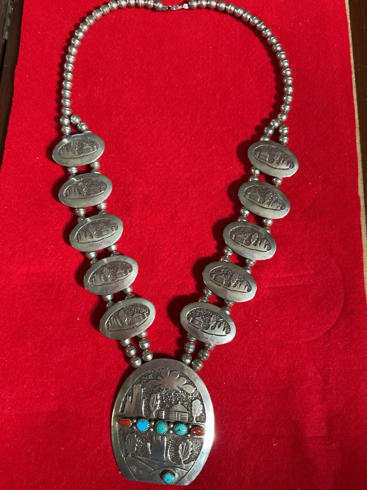 large Native American silver necklace scenes of Navaho hogan and desert land,