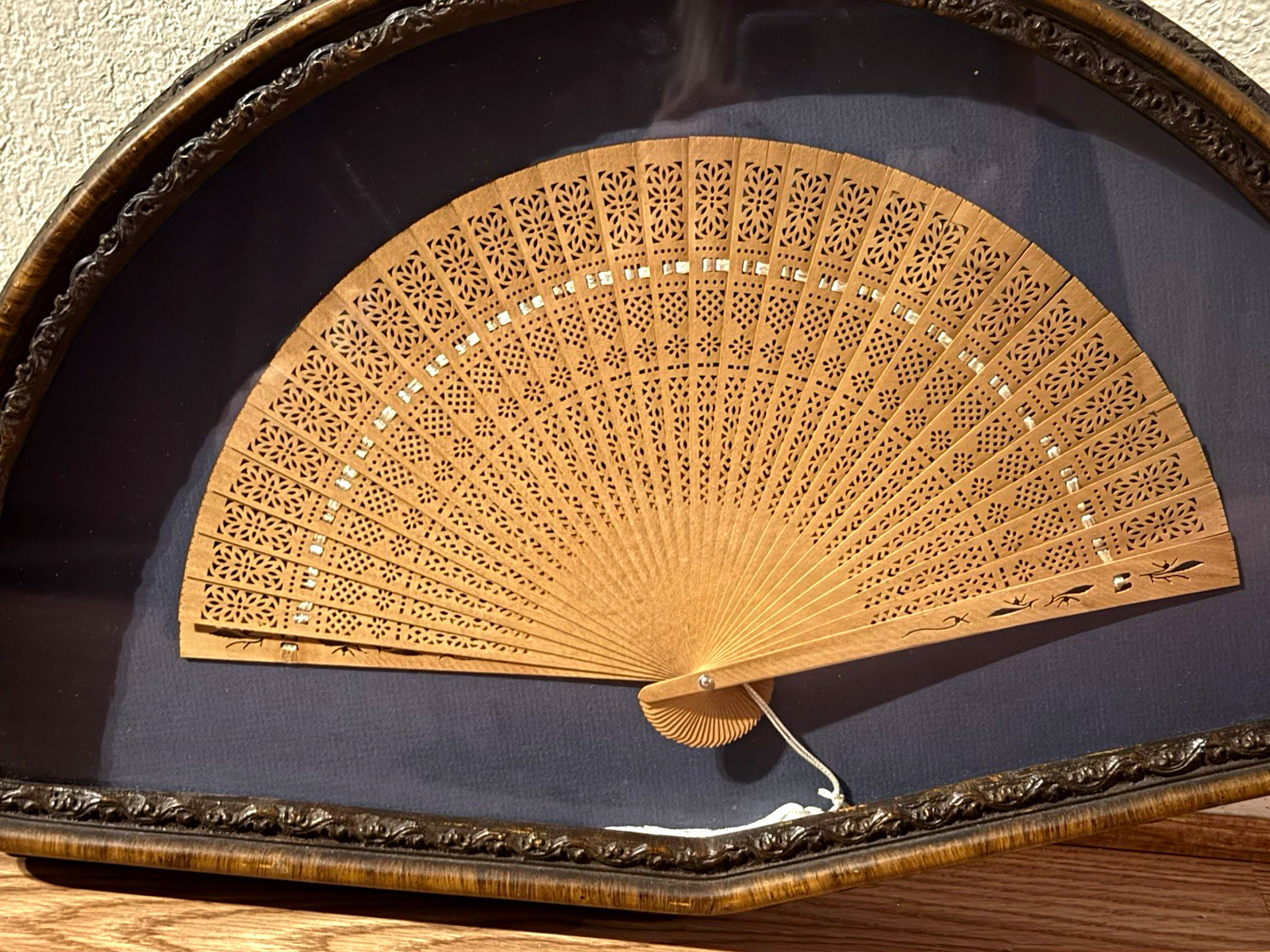 Antique fan in shadow box frame