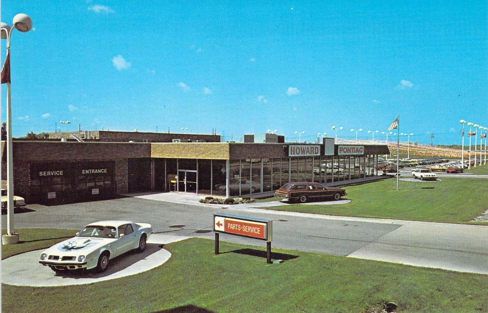 1974 IL Elmhurst HOWARD PONTIAC Dealership White Trans Am Firebird Postcard A53