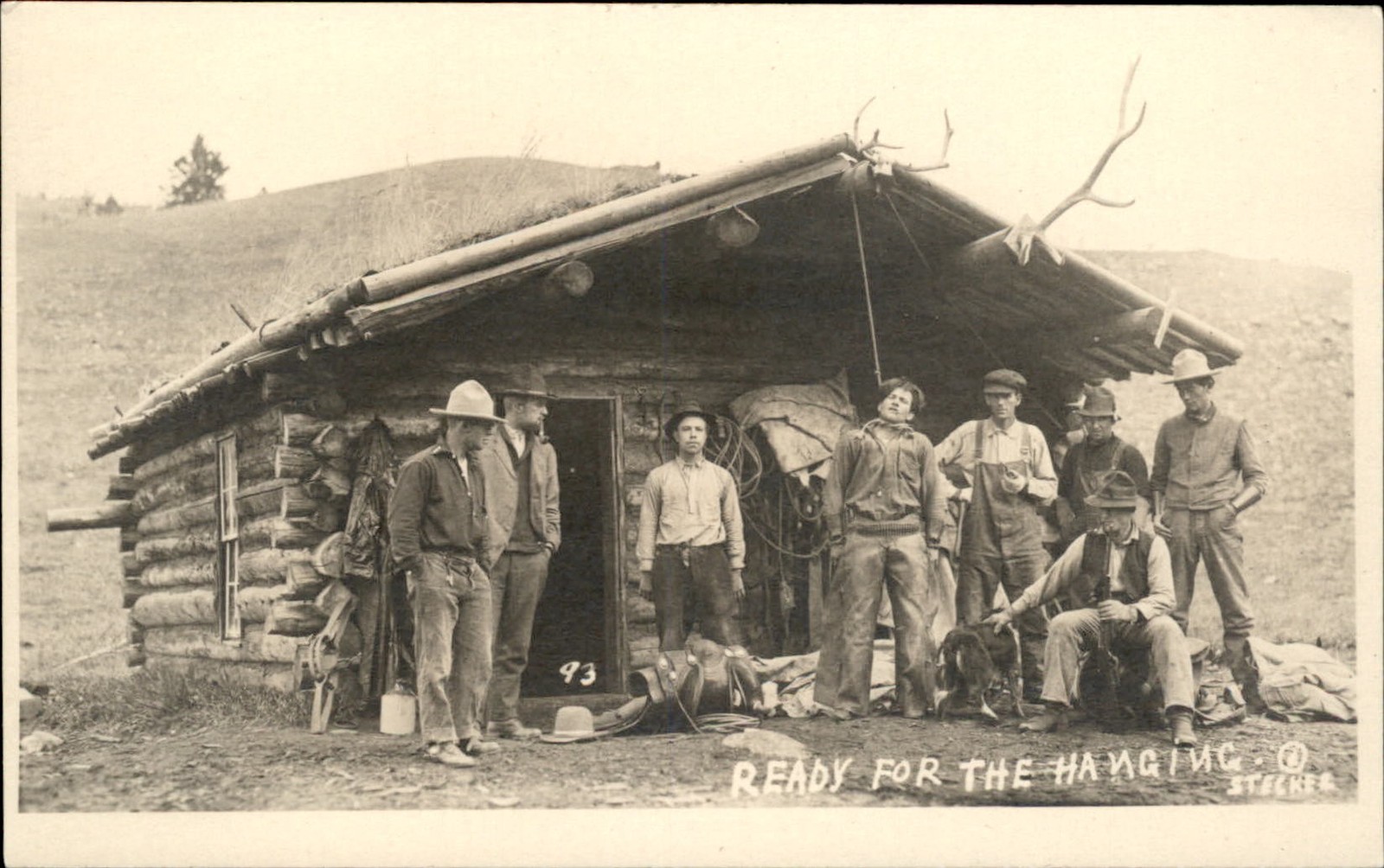 Cowboys at log cabin READY FOR THE HANGING STECKER Gilman Montana MT RPPC bhn