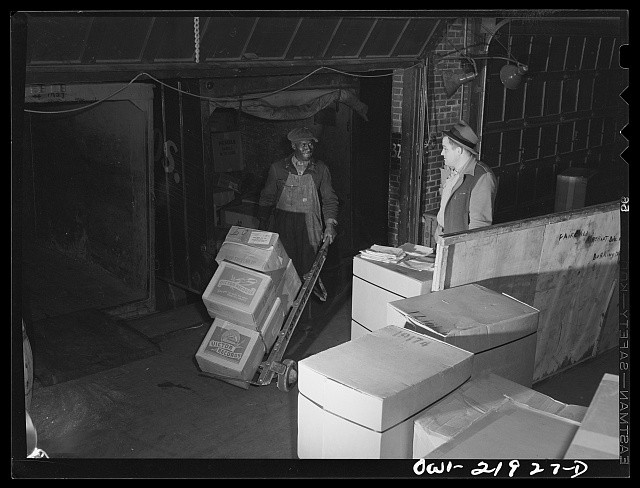Photo:New York NY 1930s Men Moving Parcel Post Boxes Warehouse