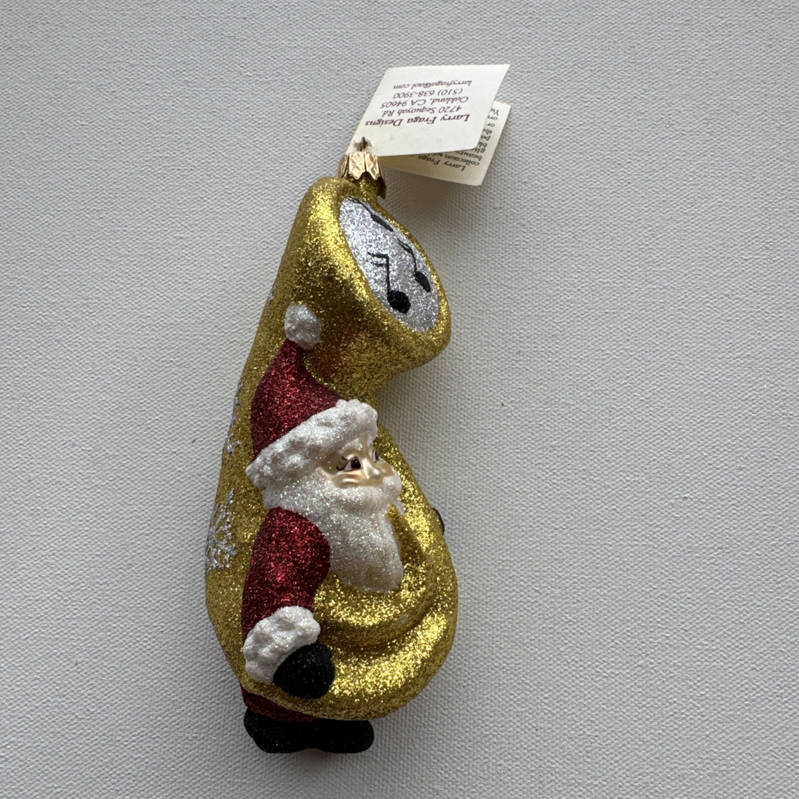 Vintage Larry Fraga Design Christmas Ornament.  Santa Claus Playing A Trombone