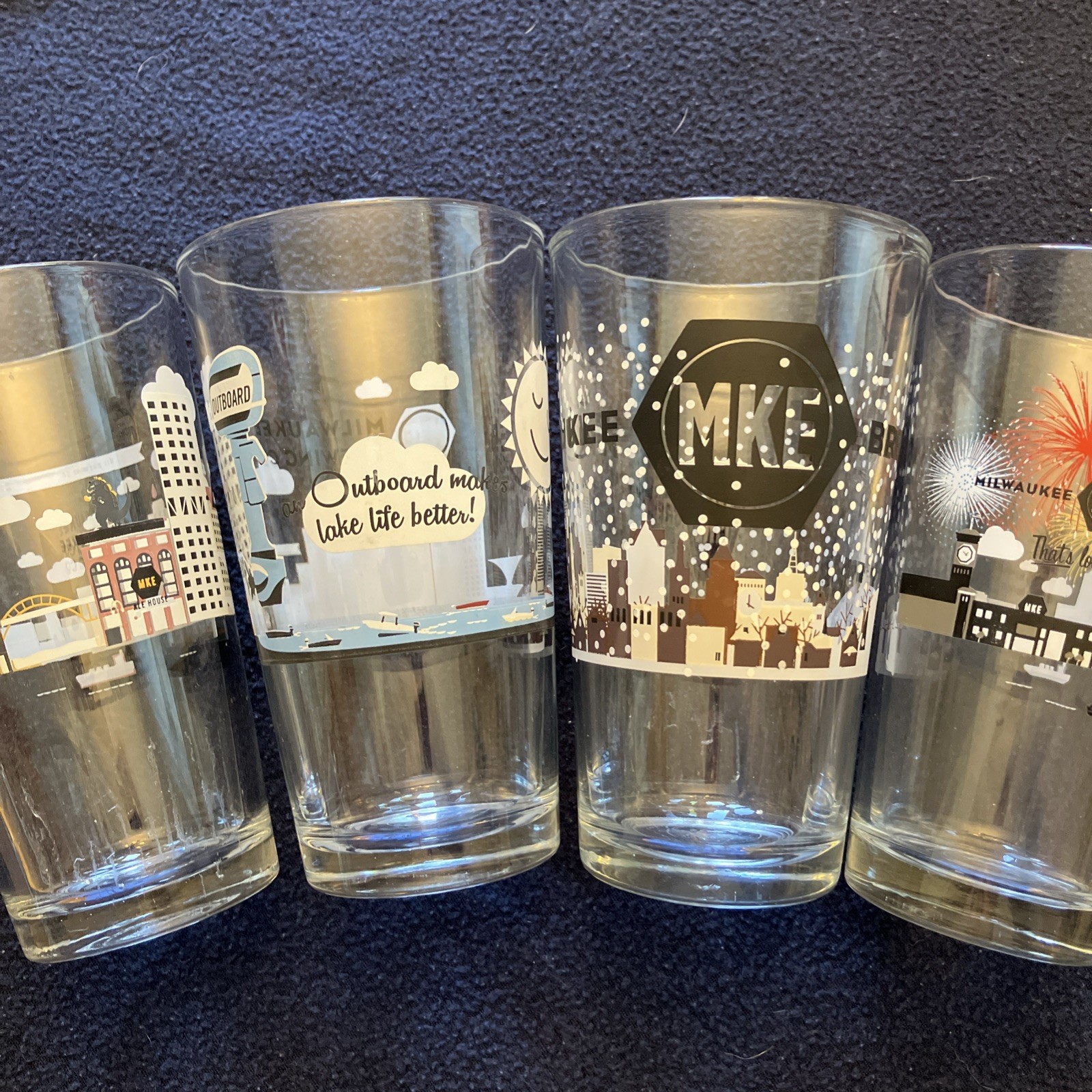 Milwaukee MKE Brewing Co 4 Glasses, Godzilla, Lake Life, Winter, Summer Milwaukee MKE Brewing Co 4 Glasses, Godzilla, Lake Life, Winter, Summer