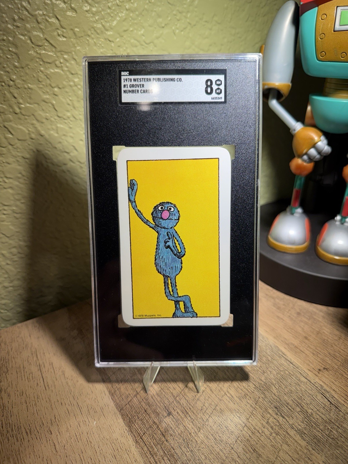 1978 WESTERN PUBLISHING SESAME STREET #1 GROVER *ROOKIE CARD* NUMBER CARD SGC 8