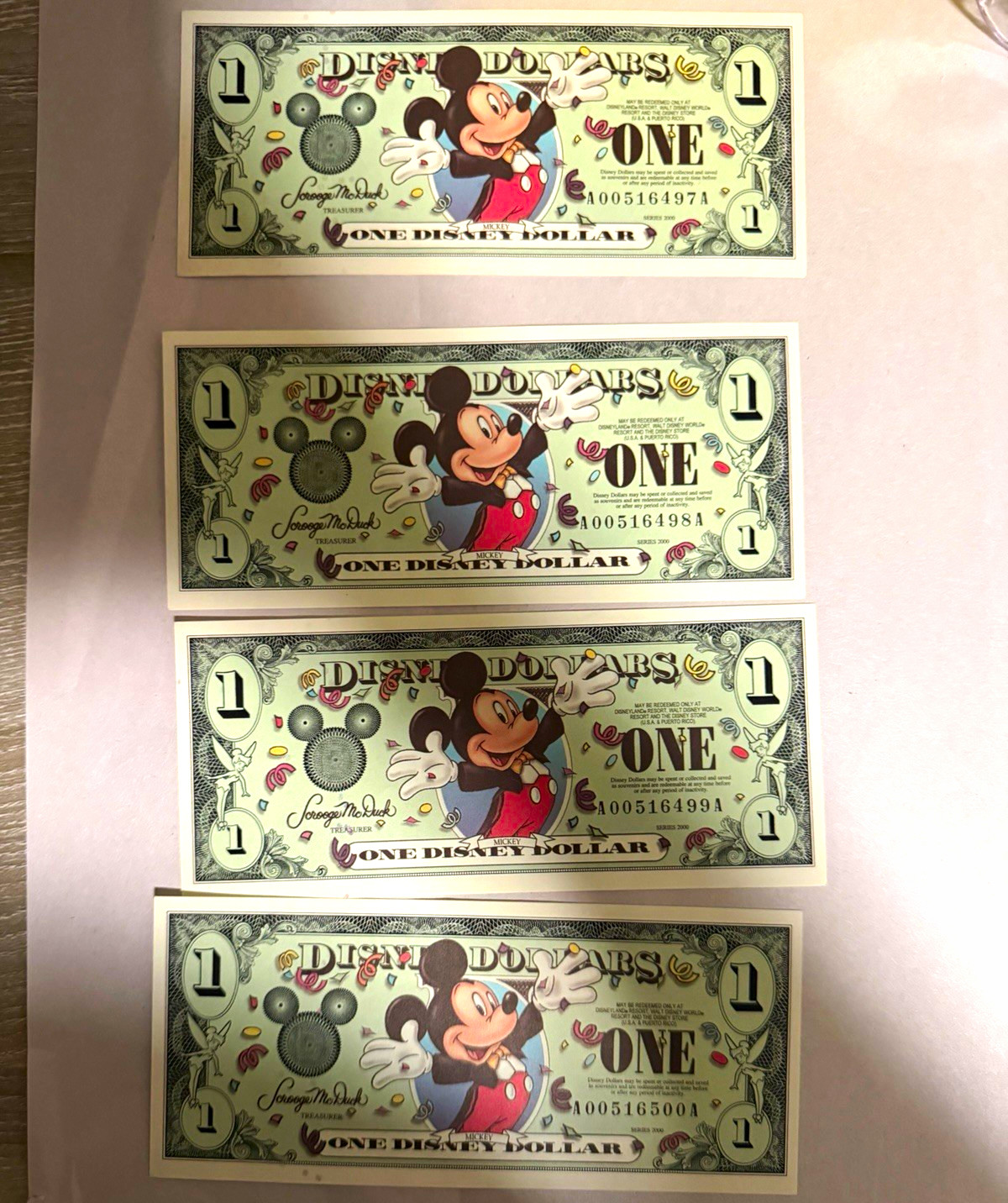 2000 Series Disney Dollars  $1 Uncirculated Consecutive Lot of 4 Series A