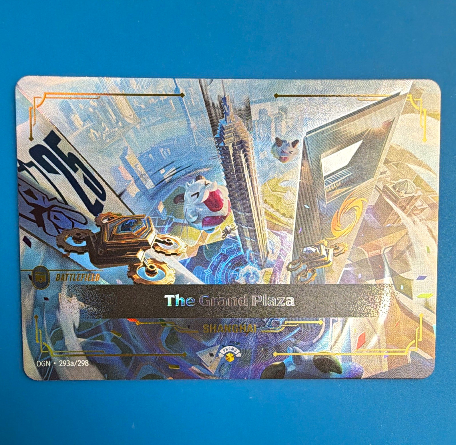 The Grand Plaza - Battlefield Promo - OGN 293a/298 NM English