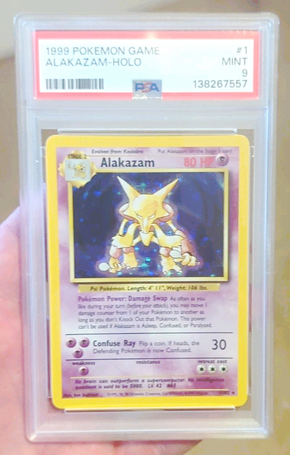 Nintendo 1999 Pokemon Game Alakazam Holo #1 PSA 9 Cert 138267557
