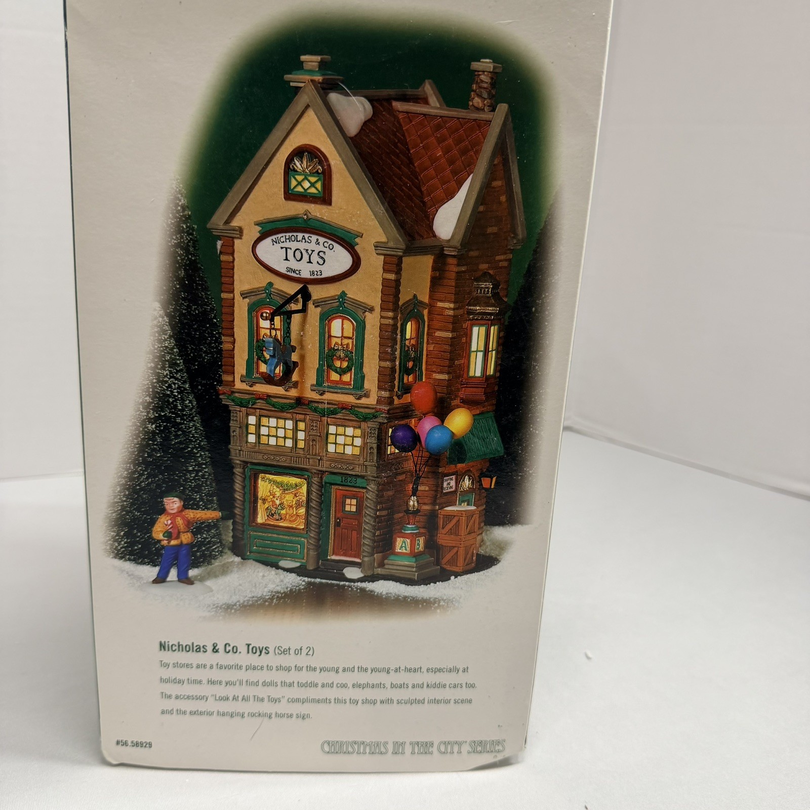 Dept 56 Xmas in the City Lighted Shop  #58929  Nicholas & Co Toys *flawed