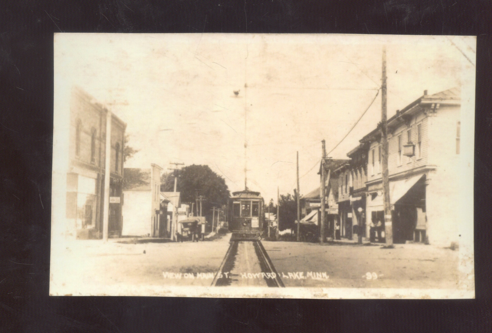 REAL PHOTO HOWARD LAKE MICHIGAN DOWNTOWN STREET SCENE TROLLEY POSTCARD COPY