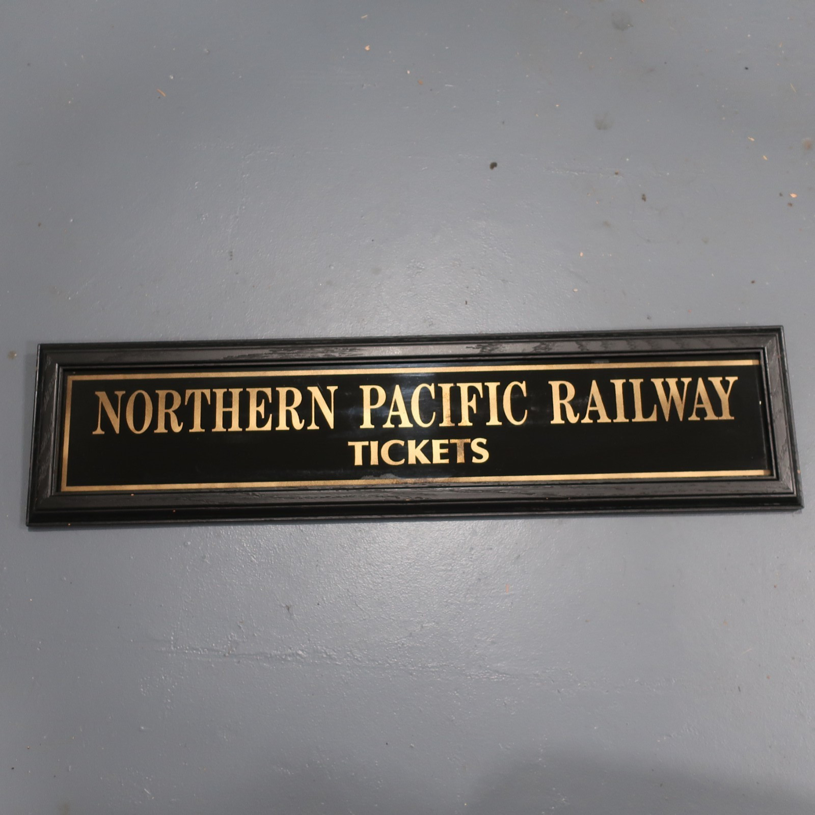 1930s NORTHERN PACIFIC RailwayRailroad Train Ticket Reverse Painted Glass Sign