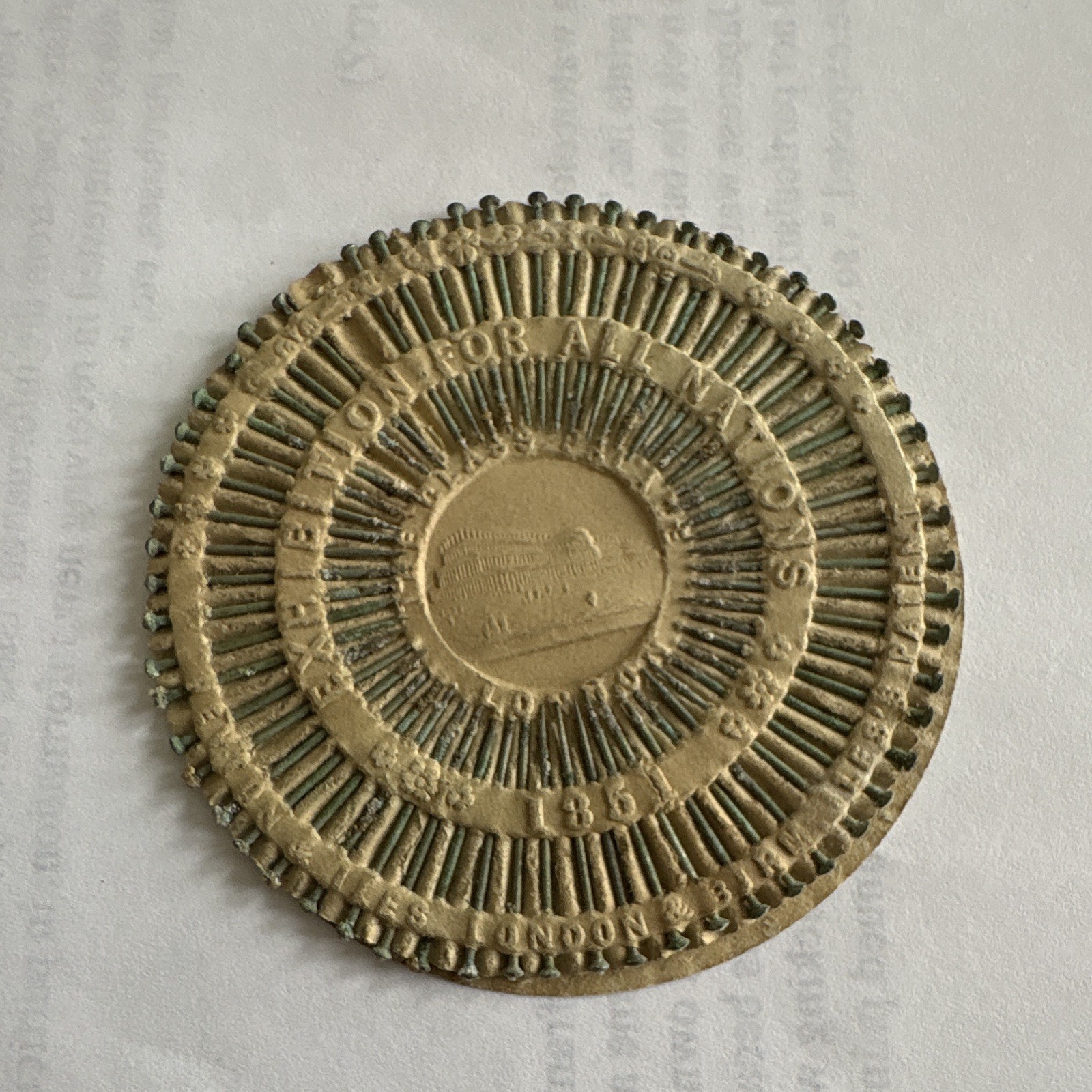 Rare 1851 Great Exhibition pin wheel embossed image Crystal Palace in London.