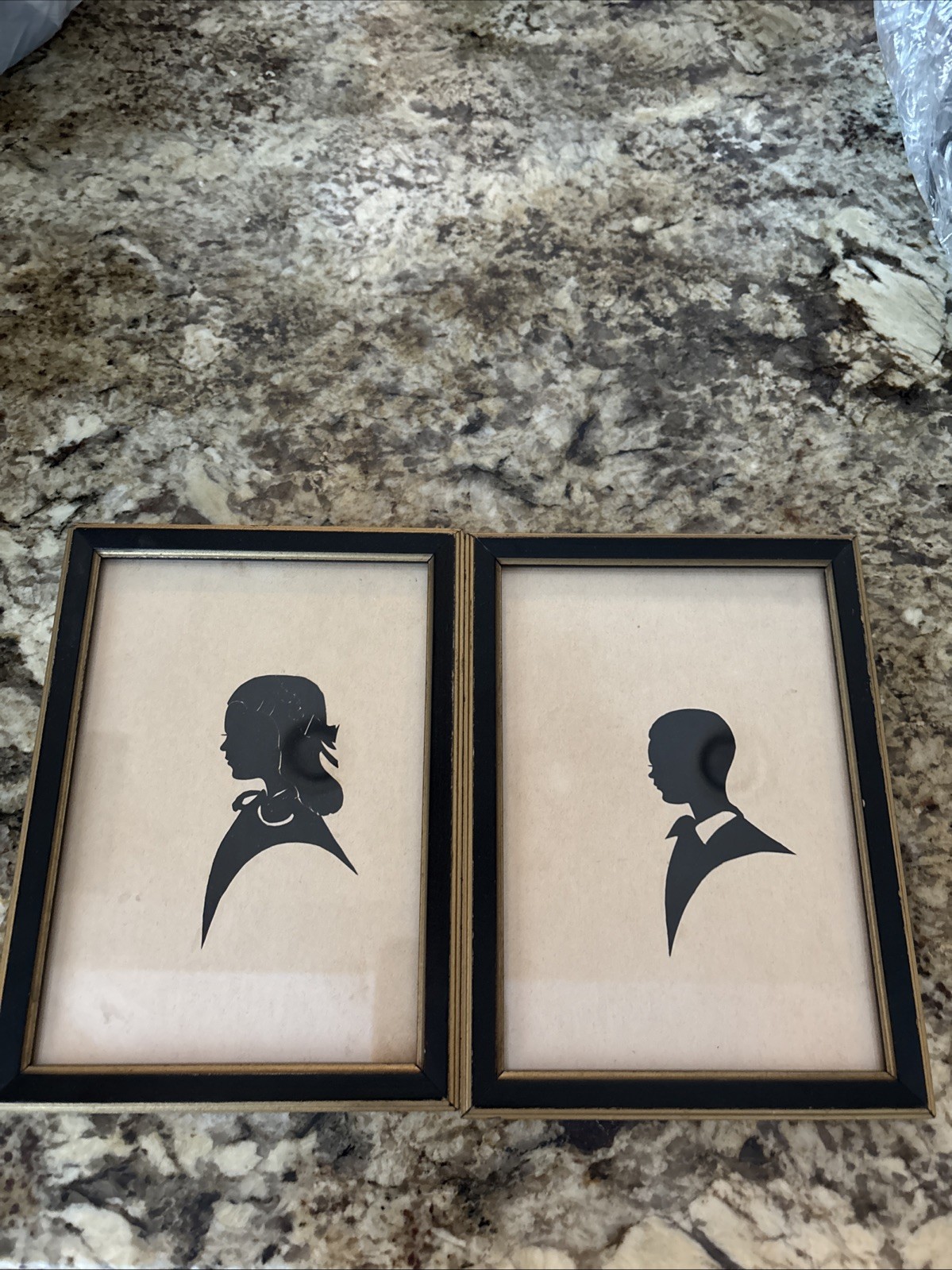 Vintage framed silhouette portraits from 1940 Kentucky state fair.