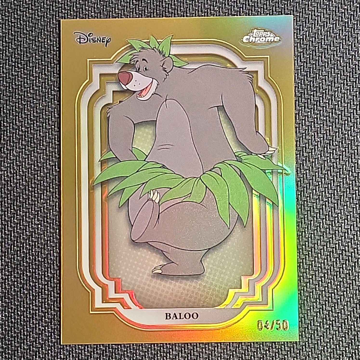 Topps 2024 Topps Chrome Disney 100 Baloo #32 Gold Refractor 04/50