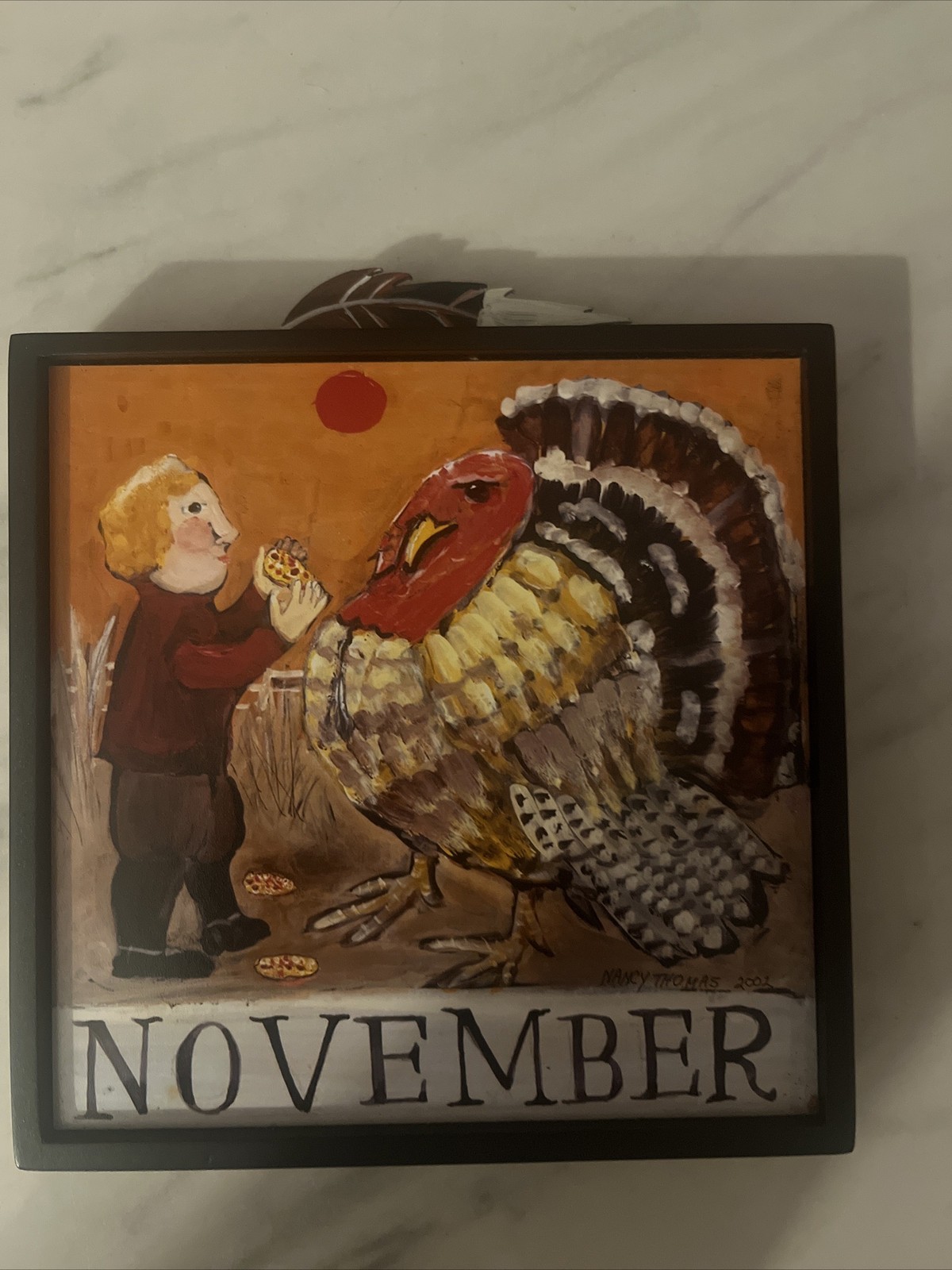 Nancy Thomas Folk Art Month 5”x5” Plaque: November w/ Feather, 2007.