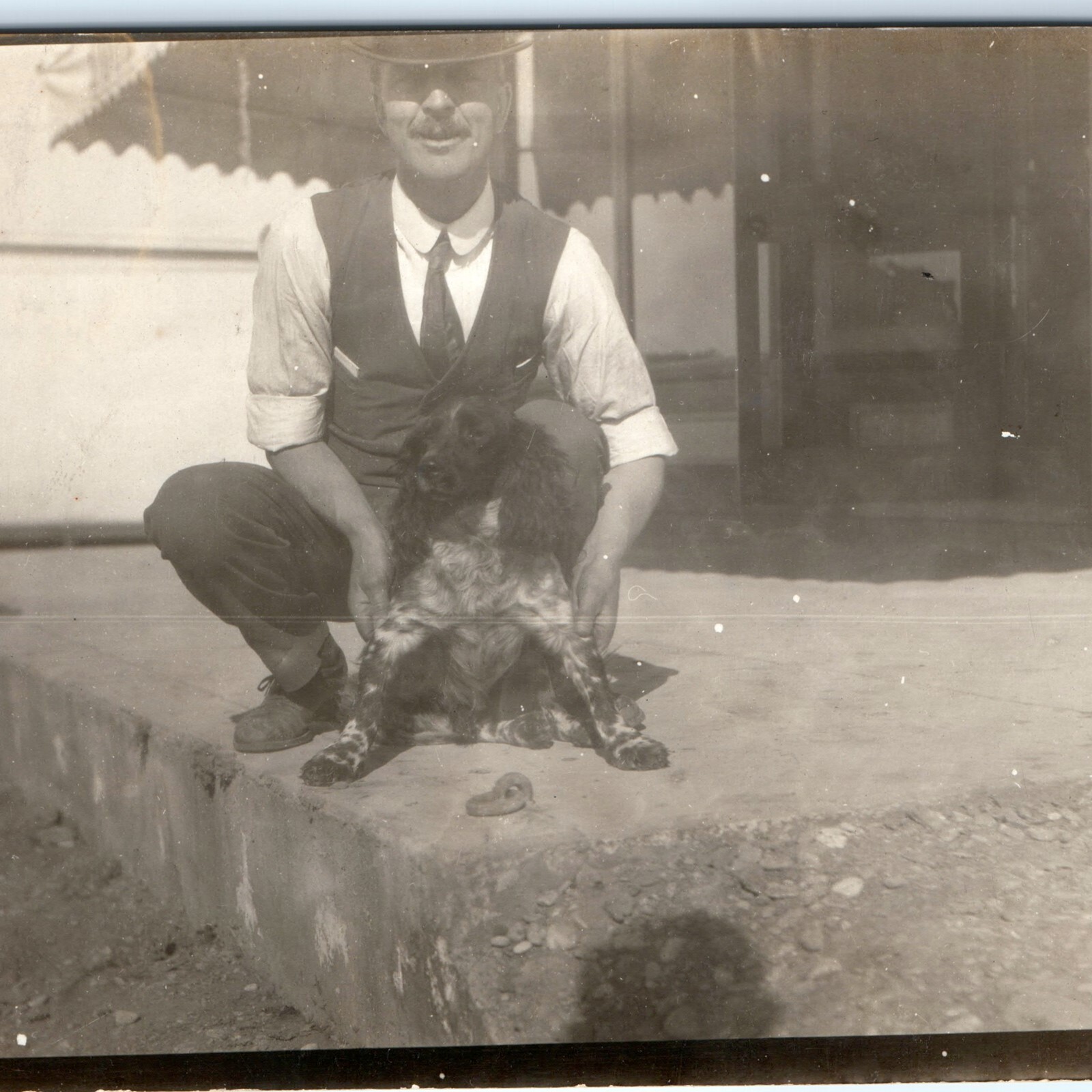c1910s Jo McKnight Store Walkway RPPC Real Photo Postcard Man & Pointer Dog