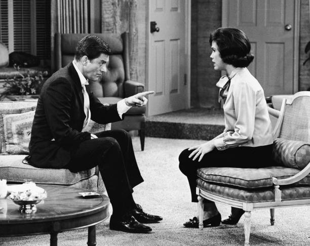 American actor Dick Van Dyke sits a couch points American actor Ma- Old Photo