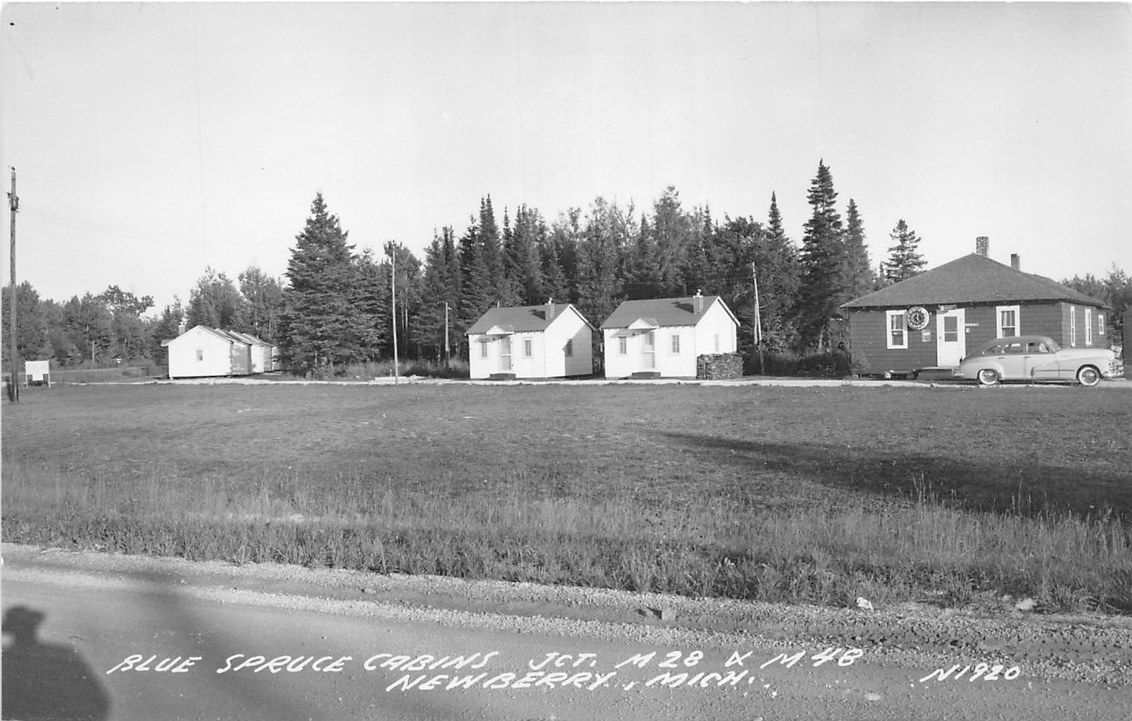 J48/ Newberry Michigan RPPC Postcard c1940s Blue Spruce Cabins 327