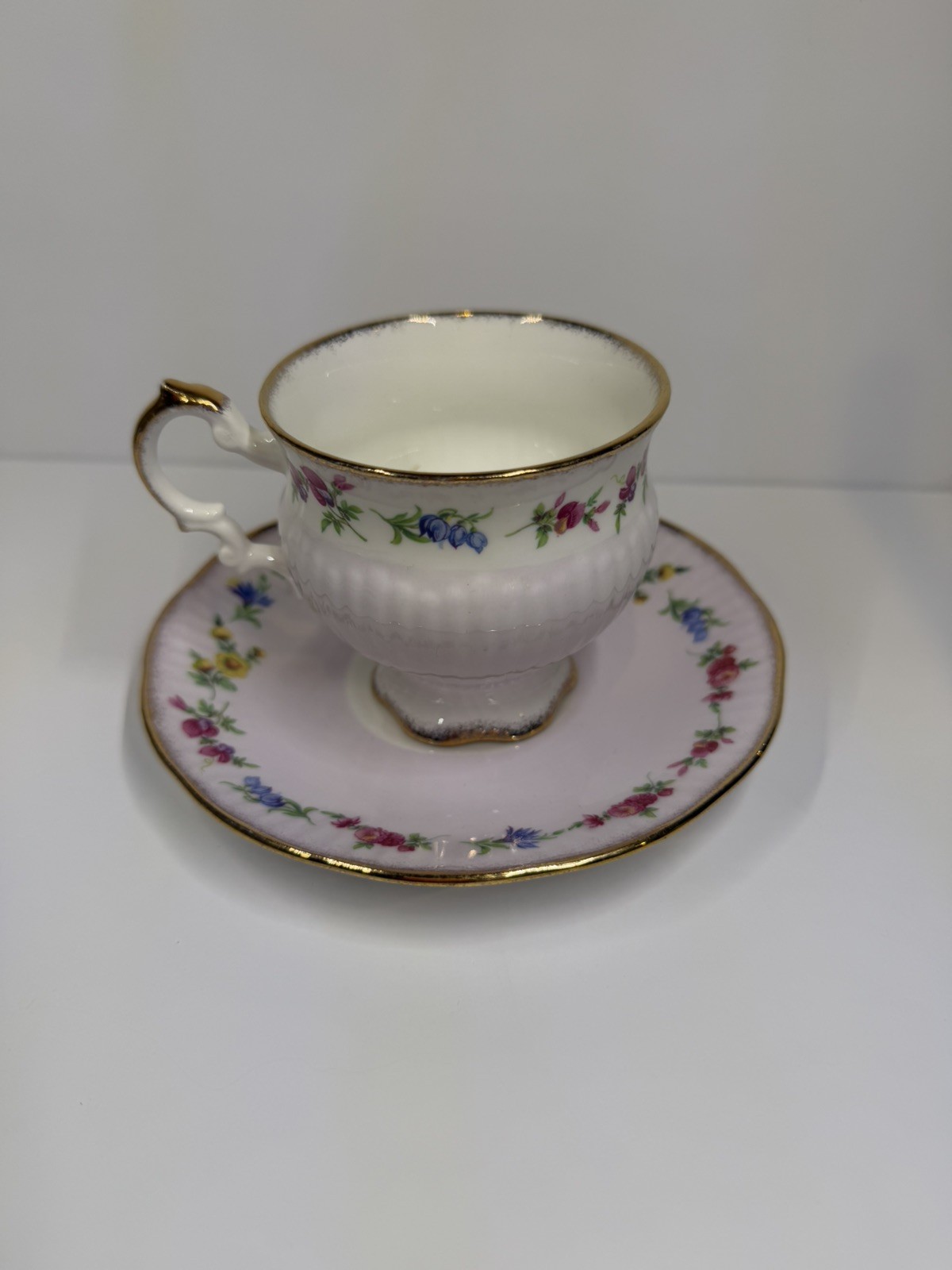 Vintage Elizabethan Fine Bone China- Floral England. Footed Tea Cup and Saucer.