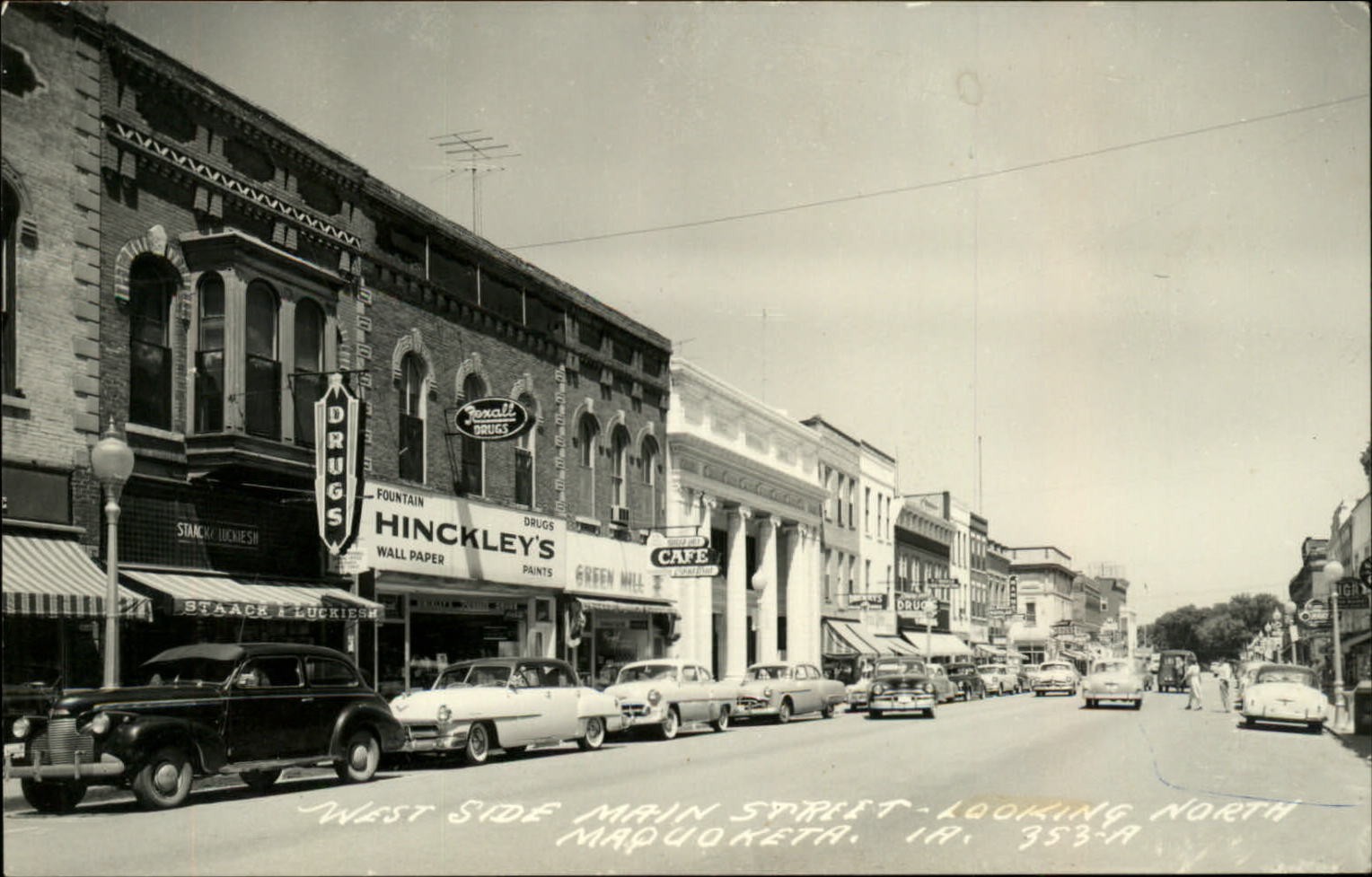RPPC Maquoketa Iowa Main Street facing North Hinckley Drug 1959 real photo PC
