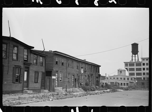Photo:1930s Row Houses Water Tower Urban Street Scene