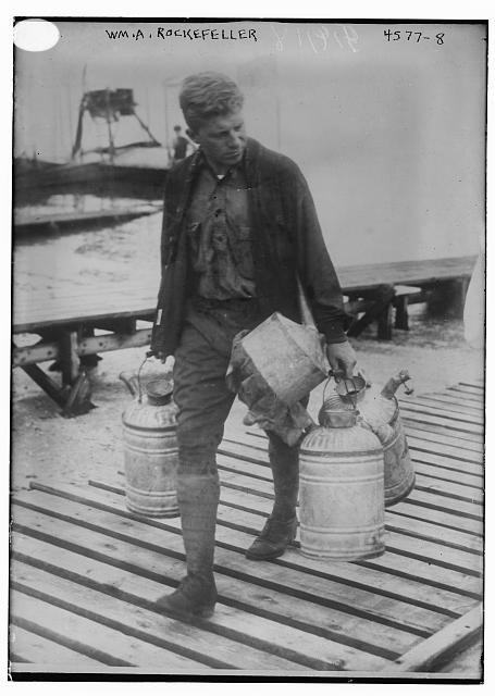 Photo:William Rockefeller 1900s Man Carrying Milk Cans Dock Waterfront