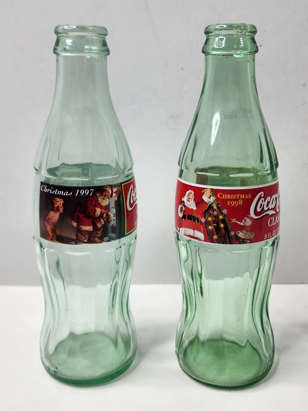 Lot of 2 - 1997 & 1998 Coca Cola Classic Christmas Bottles - Santa Claus