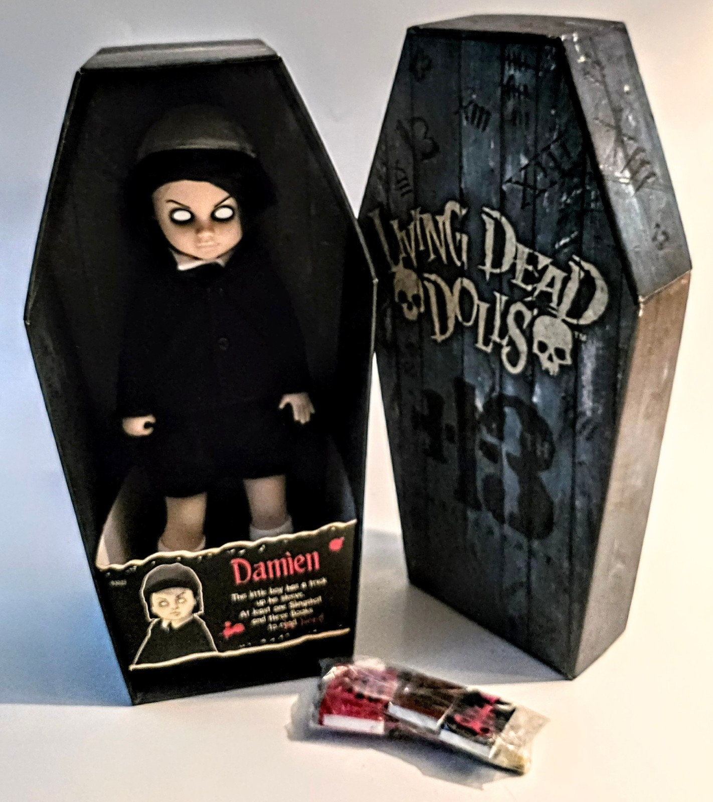 2011 Mezco Living Dead Doll Damien -Coffin & Death Certificate Included